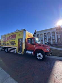 W.B. Mason parked in front of the Leo J. Meehan School of Business
